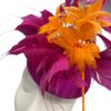 Stunning magenta pink headpiece with matching magenta and orange feather structure detail.