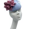 Baby blue headpiece with pink leather flower detail.