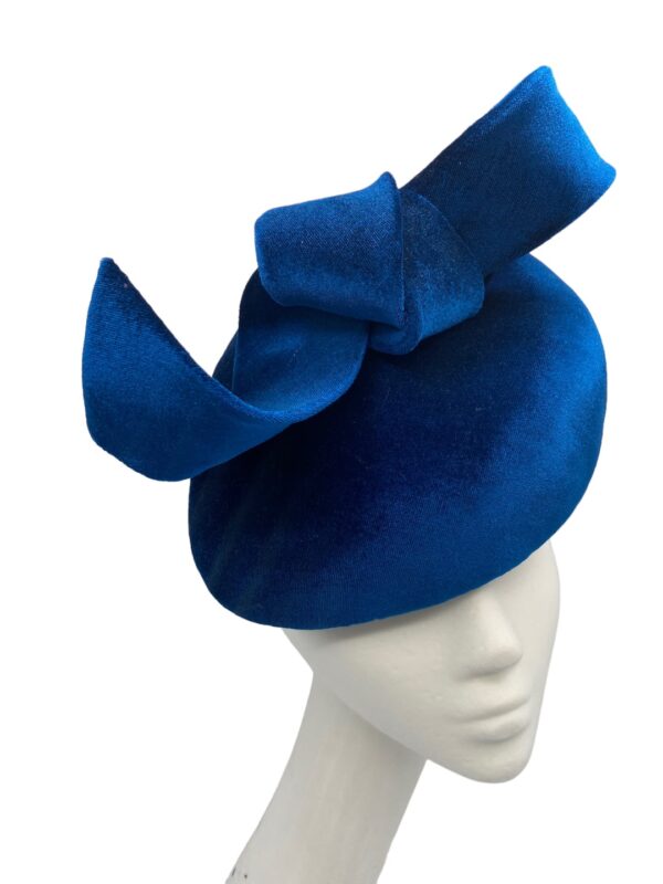 Petrol blue/teal velvet teardrop headpiece with bow detail.