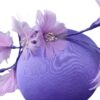 Fabulous lilac headpiece with quirky baby pink flower detail.