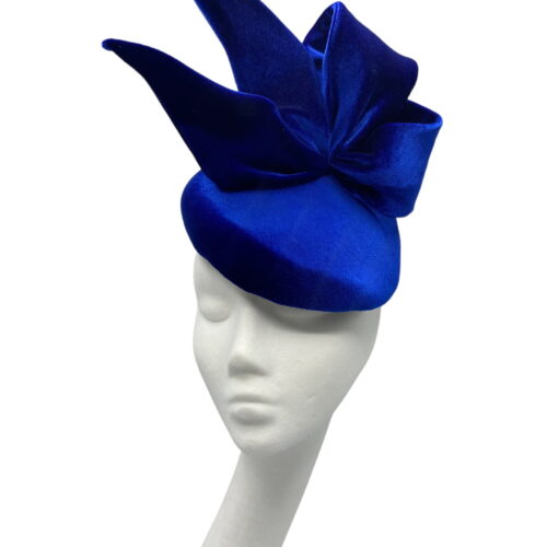 Cobalt blue velvet headpiece with side bow detail to finish.
