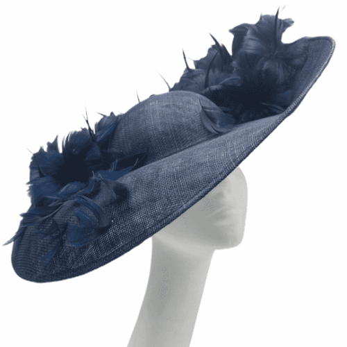 Large Navy headpiece in a stunning shape and finished with a sprinkle of navy feathers on top.