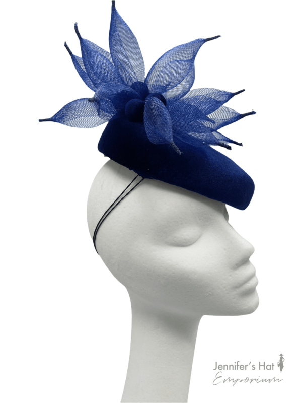 Navy velvet sloping beret with stunning navy handmade flower detail.