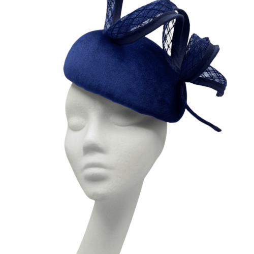 Stunning navy blue velvet beret with structured swirl detail. 