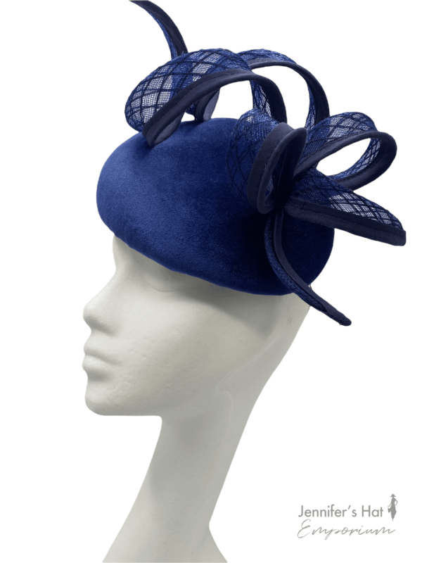 Stunning navy blue velvet beret with structured swirl detail. 