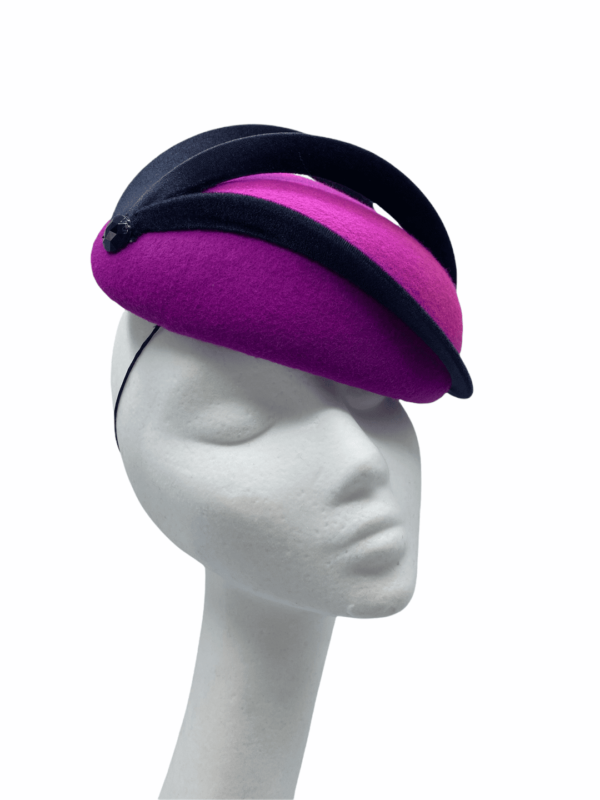 Stunning purple and pink felt headpiece with black swirl detail overlay.