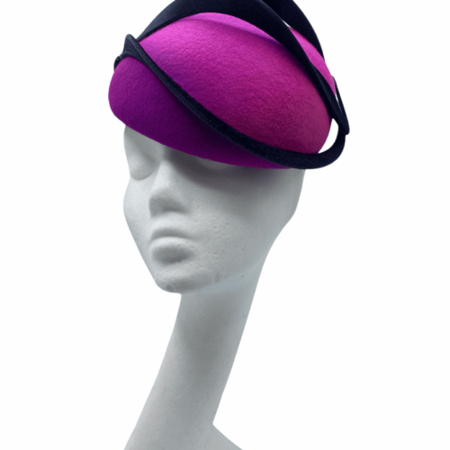 Stunning purple and pink felt headpiece with black swirl detail overlay.